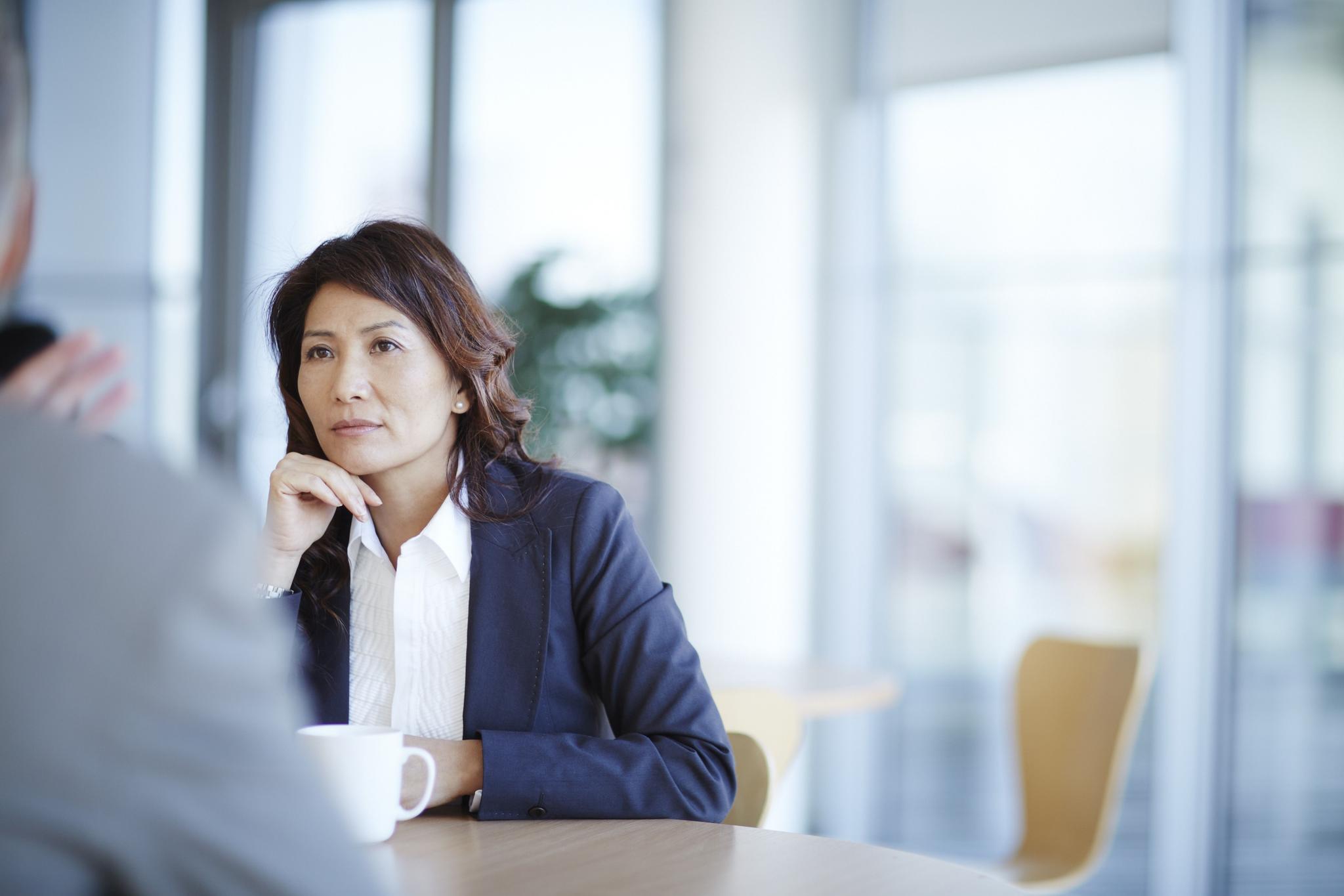 Risk professional engaged in a disucssion.