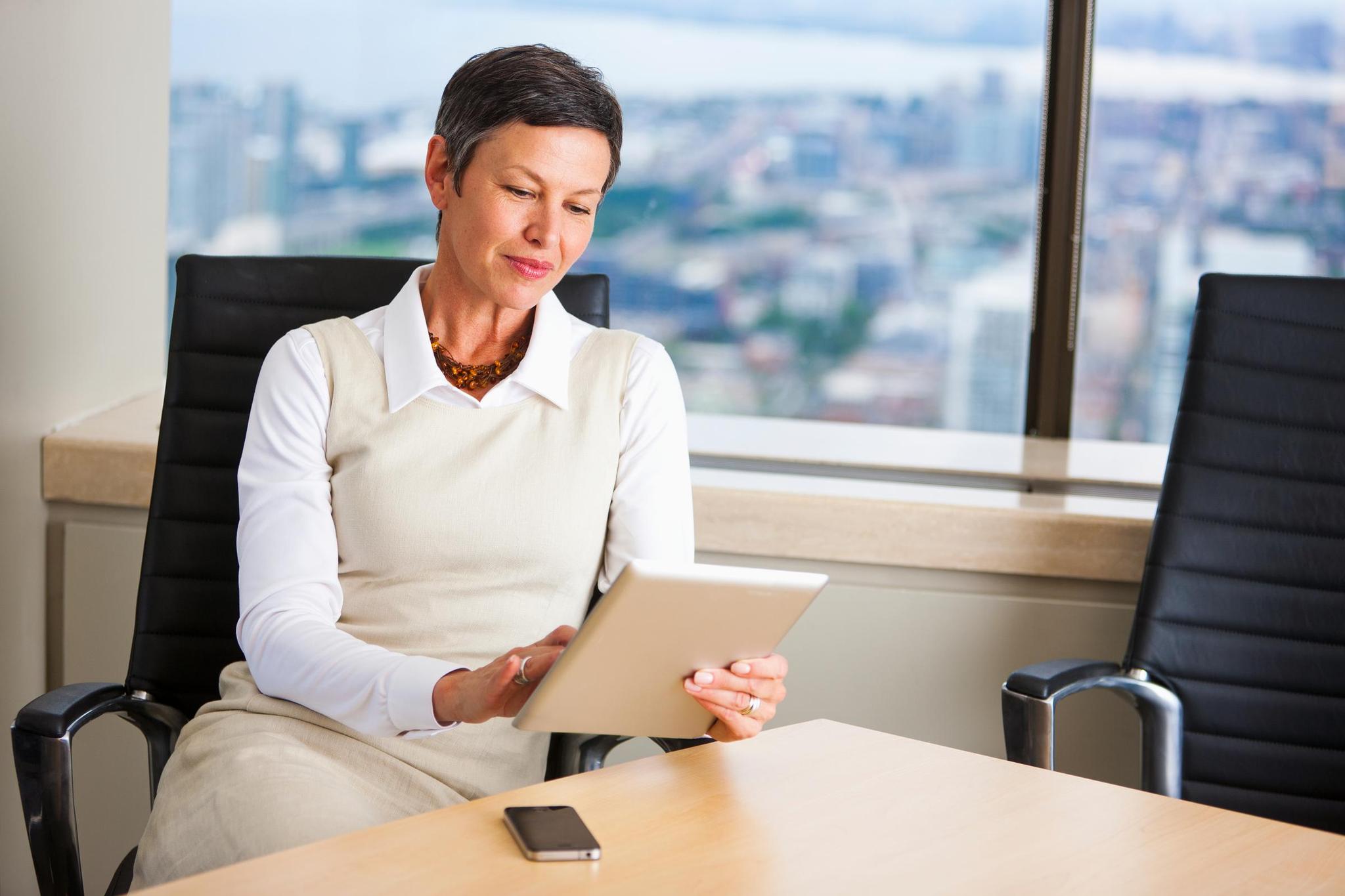 Board member reviews the best practices for board of directors' self assessments