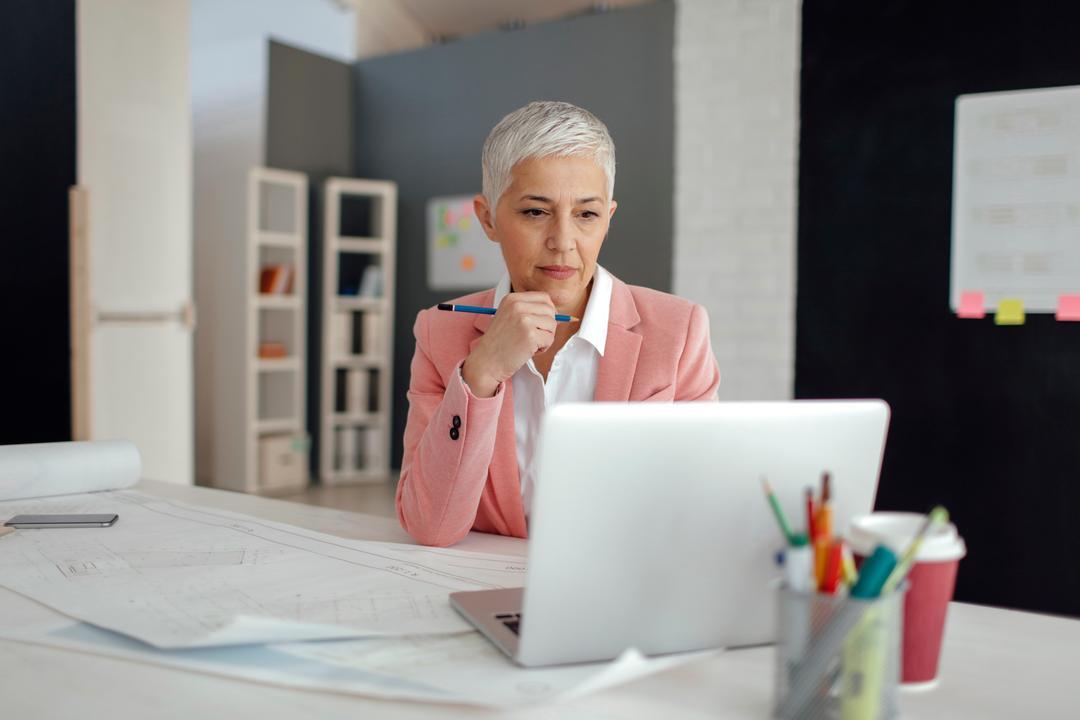 Female board member reading about fiduciary duties