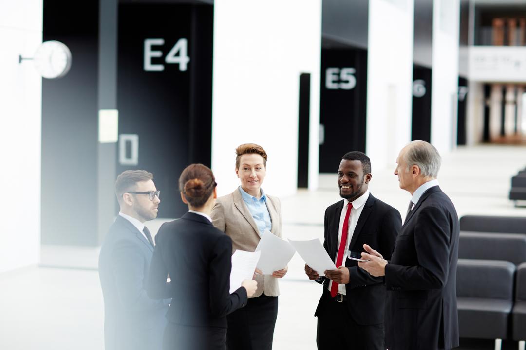 Board members discussing the board evaluation report